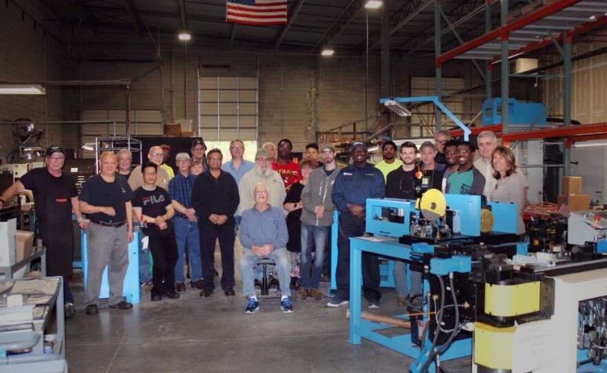 Lisa Winton, seen at far right with workers at Winton Machine in Suwanee, Ga., before the pandemic. She says her company is looking for more workers to meet a rush of orders.