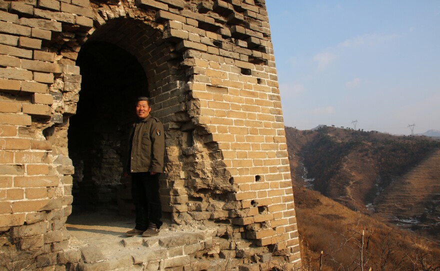 Qiao Guohua, a resident of Jielingkou village, is paid a small sum of money by the local government to patrol a section of the Great Wall. He's come to know every feature of the wall and its surrounding landscape intimately.