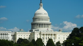 The U.S. Capitol is seen from Pennsylvania Avenue, on Aug. 30. The House voted Tuesday to extend government funding past this fall's midterm elections.