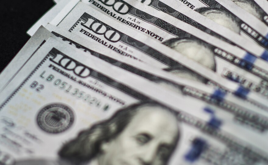 A former bank teller pleaded guilty Thursday to stealing more than $185,000 from a homeless customer.