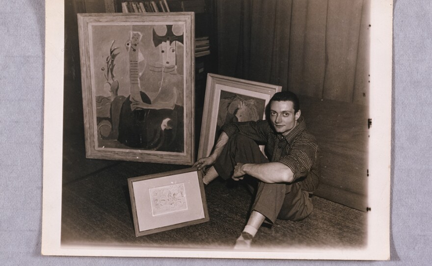 Roy Lichtenstein sitting in his studio, 1950s