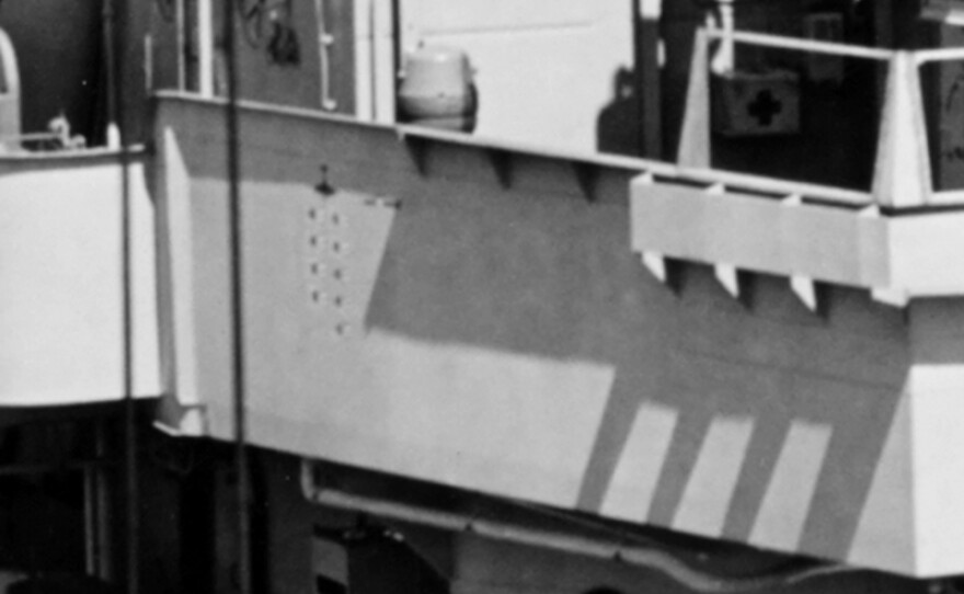 Close crop of a photo that reveals the ship’s scorecard with the nine Japanese flags as it was on July 12, 1945 at the Mare Island Navy Yard following her final overhaul.