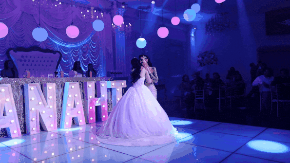 Leticia and Anahi Sareñana dance the first waltz at Anahi's quinceañera in Chula Vista, May 31, 2026.