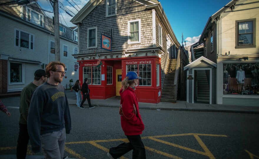 People walk on Commercial Street. Some locals believe if Provincetown was accessible in the off-season, the area could host more revenue-generating events during the quieter months.