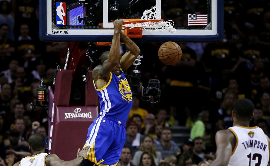 Andre Iguodala dunks Tuesday during Game 6 of the NBA Finals in Cleveland.