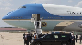 U.S President Barack Obama walks up the steps of Air Force One on departure at the Torrejon military air base in Madrid, Spain Sunday, July 10, 2016.
