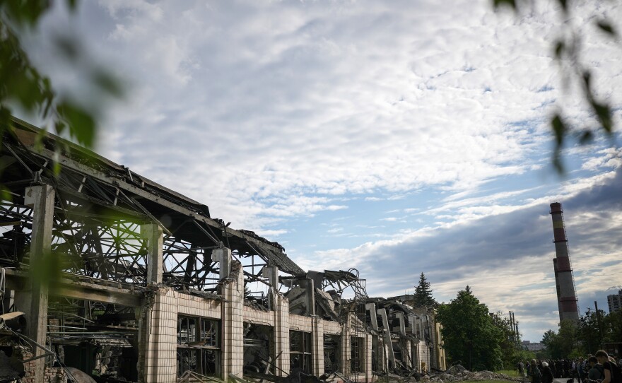 Extensive damage can be seen to a railcar repair facility in Kyiv on Sunday.