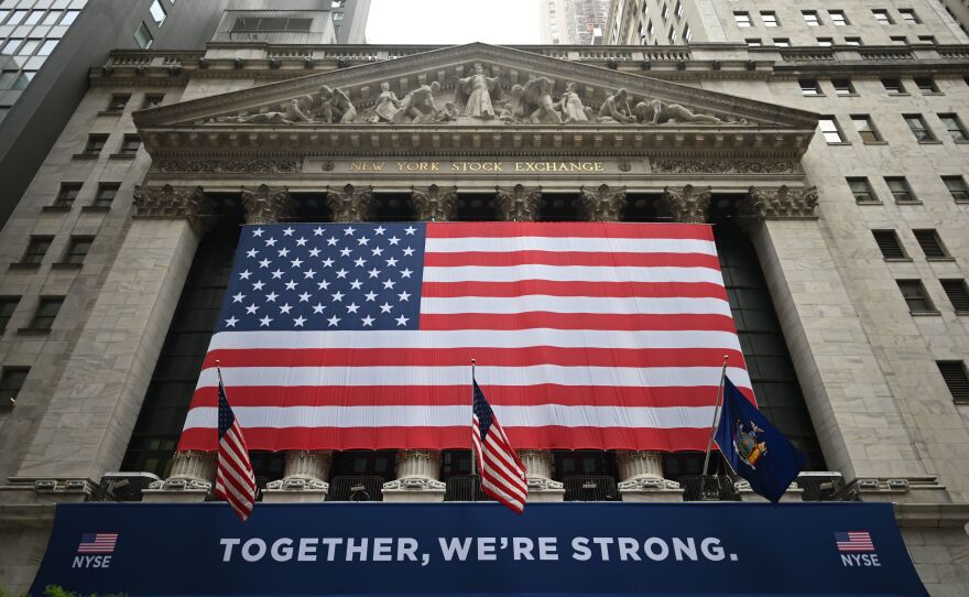 Stocks fell sharply Thursday after coronavirus cases spike and the Federal Reserve warned that the recovery will take a long time.