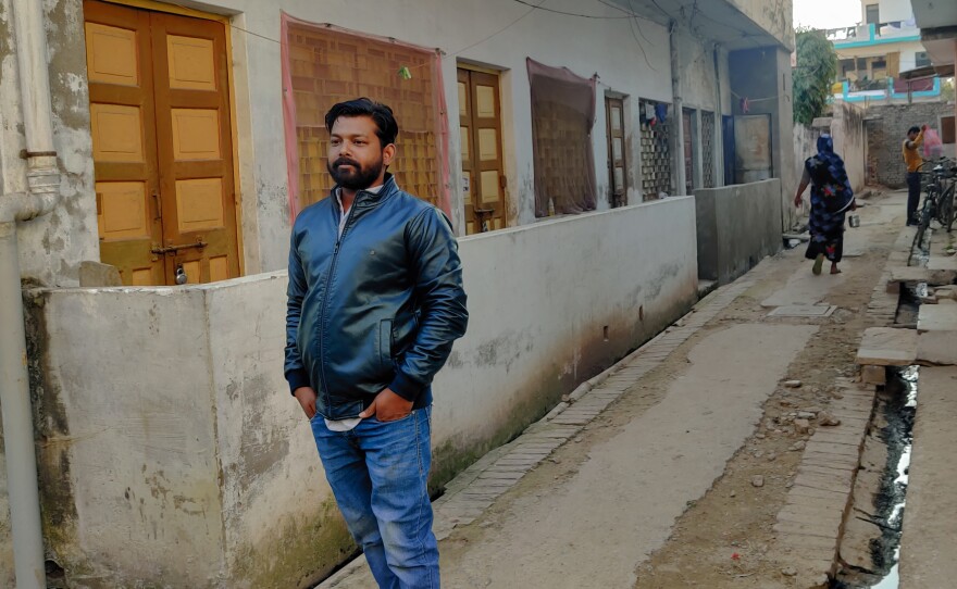 Sumit Guatam holds four degrees — but no job. He's part of a growing unemployment crisis in India. He stands in front of the house his parents had built in the city of Prayagraj. When he came there to study, they gave the house to him.
