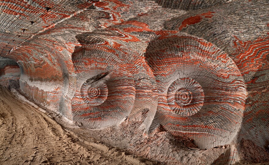 An underground potash mine in the Ural mountains of Russia. The potassium-rich salt is mined to produce fertilizer. The team says that the mine shows the impact of modernized agricultural practices that help feed Earth's 7.5 billion people. The spiraled pattern seen here is caused by the machines used to extract the salts.
