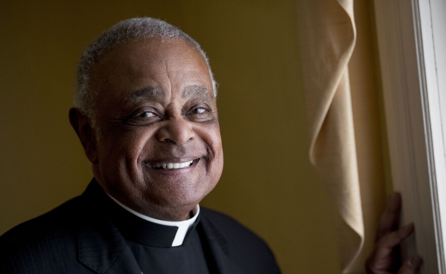 In this 2019 file photo, Washington D.C. Archbishop Wilton Gregory poses for a portrait following mass at St. Augustine Church in Washington. Pope Francis has named Gregory among 13 new cardinals.