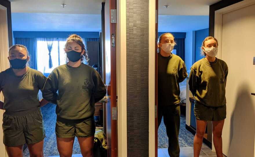 Female Marine recruits in front of their hotel rooms where they are under quarantine before starting basic training at Marine Recruit Depot San Diego, Feb. 5, 2021.