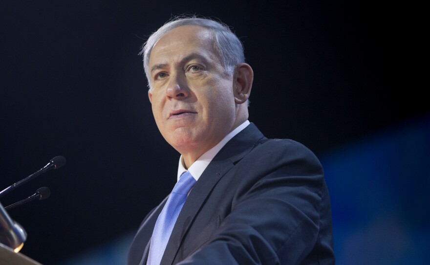 Israeli Prime Minister Benjamin Netanyahu speaks at the American Israel Public Affairs Committee Policy Conference in Washington earlier this month. In an interview with NPR's Morning Edition, Netanyahu said a separate Palestinian state is unachievable "under present circumstances."