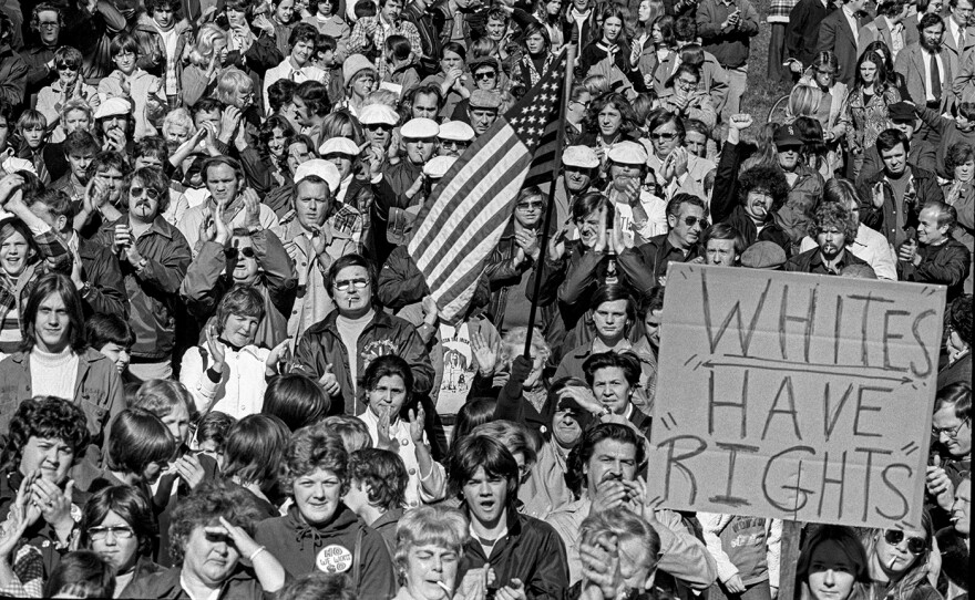 Opponents of the court-ordered school desegregation plan rally at Thomas Park in South Boston. AMERICAN EXPERIENCE "The Busing Battleground"