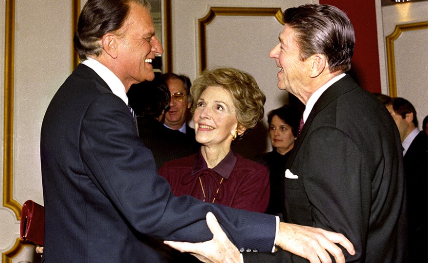 Billy Graham (left) with Nancy and Ronald Reagan. 1981.