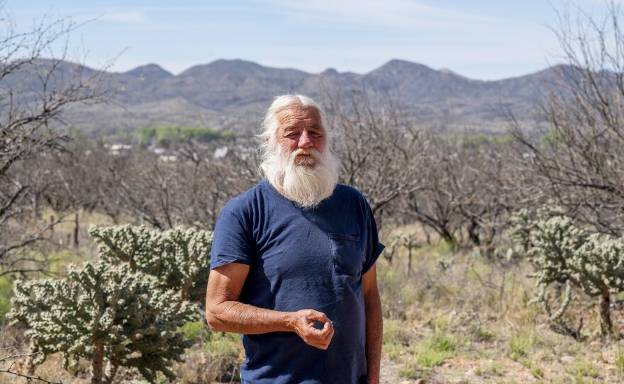 Ken Buchanan is the unofficial "mayor" of Arivaca, which actually has no local government. "We're more interested in getting along than having a debate with somebody we wholeheartedly disagree with," he says. "There's no sense in doing that."