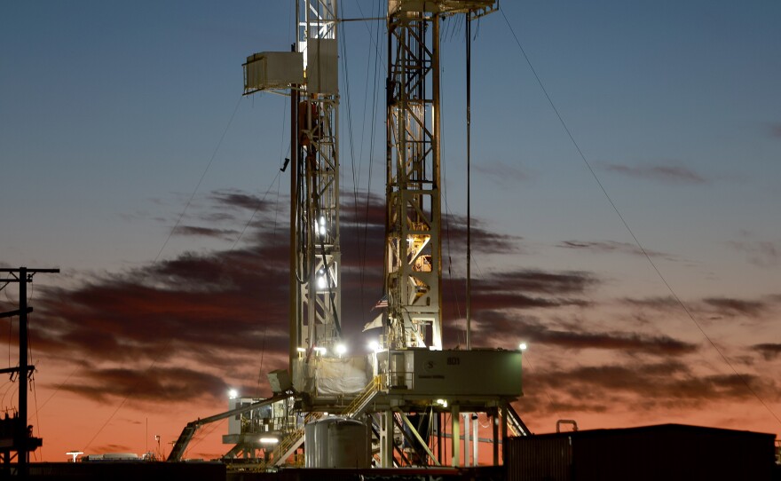 An oil drilling rig setup in the Permian Basin oil field in Midland, Texas, is pictured on March 13.