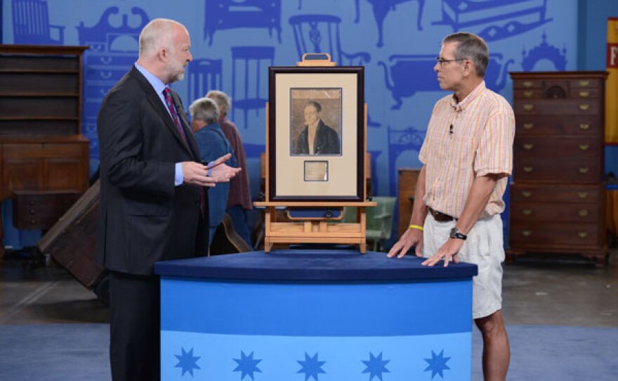 Alasdair Nichol (left) appraises an 1821 John James Audubon portrait in Birmingham, Alabama.