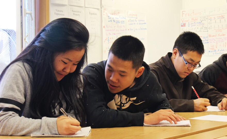 Rosie Matthias, Byron John, and Pedro Active, ninth graders in a Yup'ik language class at the Newtok School. Residents worry they will lose their language and culture if they are forced to scatter as their land erodes.