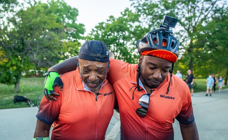 Father and son, Donnie and Eric celebrating the completion of their 350-mile bike trip.