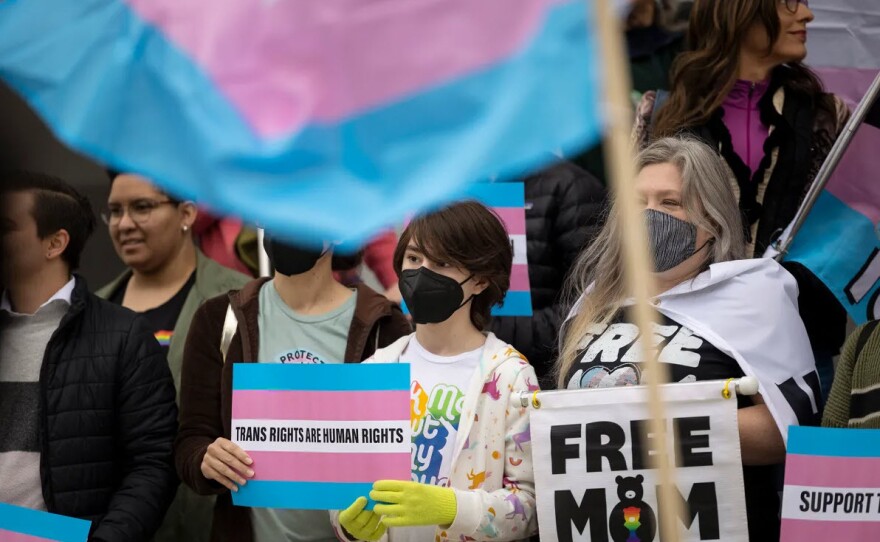 Supporters of transgender rights gathered at the Capitol during a press conference on March 17, 2022.