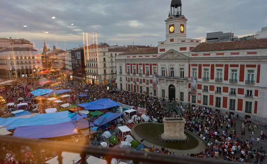 Protesters camp during a protest following the eviction last Wednesday of 87-year-old Maricarmen to demand stronger laws to protect renters at Sol square in Madrid, Spain, Sunday, Sept. 27, 2026.