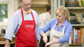 Christopher Kimball and Bridget Lancaster work on family-friendly recipes in the kitchen. 