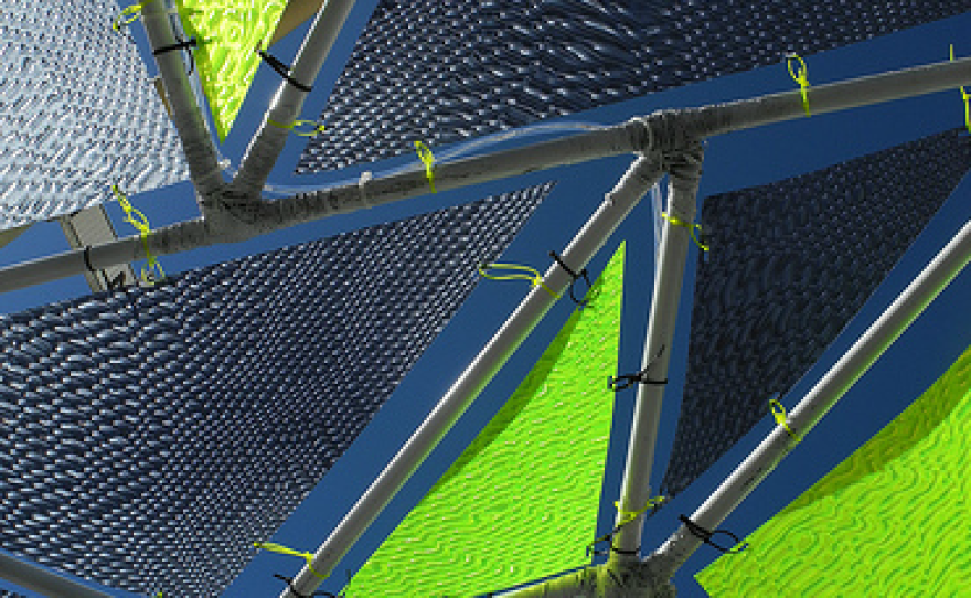 The solar parasols look more like awnings than umbrellas, and the prototypes are designed to be light, colorful, and sturdy.