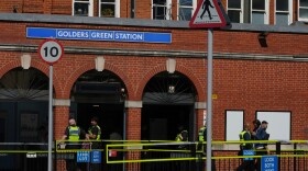 Police on duty outside Golders Green tube station in London, Thursday, April 30, 2026, near the scene where two people were recently stabbed in the Golders Green neighbourhood, that has a large Jewish community.