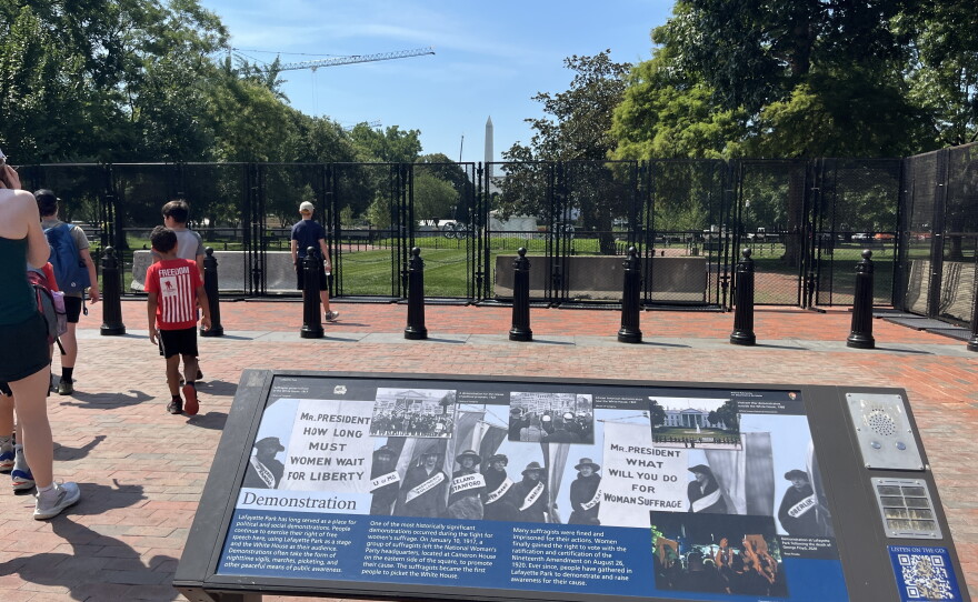 An informational plaque outside the park highlights its long history of public demonstrations.
