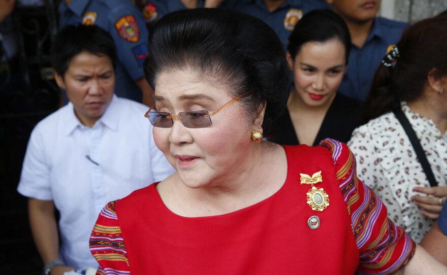 Imelda Marcos arrives at the Commission on Elections to lend support for her daughter Imee Marcos in filing her candidacy for a Senate seat in 2018 in Manila.