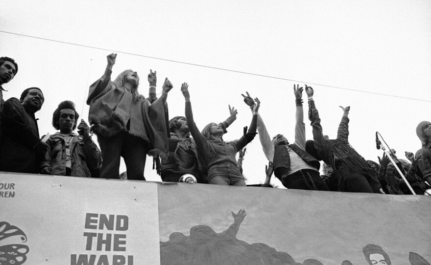 Cast members of the play Hair join activist and Southern Christian Leadership Conference co-founder Rev. Ralph Abernathy (second from left) during an anti-war rally in San Francisco's Golden Gate Park on Nov. 15, 1969.