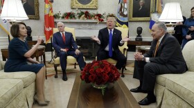 President Donald Trump and Vice President Mike Pence meet with Senate Minority Leader Chuck Schumer, D-N.Y., and House Minority Leader Nancy Pelosi, D-Calif., in the Oval Office of the White House, Tuesday, Dec. 11, 2018. 