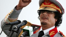 Libyan  leader Moammar Gadhafi speaks in Tripoli on June 12, 2010, during a ceremony marking the 40th anniversary of  the evacuation of the American military bases in the country.