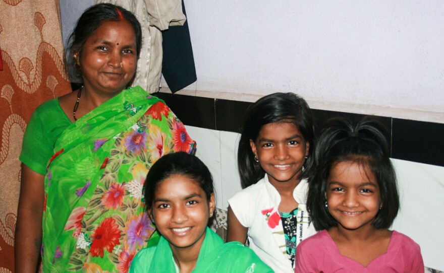 Rima Prajapati with daughters (from left) Jhoti, Aarti and Sangeeta. Jhoti and Aarti were both born deaf. Rima moved her daughters from their village to Mumbai so they could attend a school for the deaf.