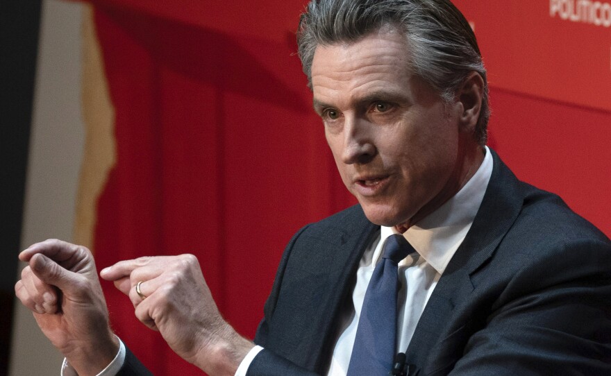 California Gov. Gavin Newsom speaks during an interview in Sacramento, Calif., on Tuesday, Sept. 12, 2023. Newsom signed a bill on Monday, Sept. 25, 2023, to ban school boards from rejecting textbooks based on their teachings about the contributions of people from different racial backgrounds, sexual orientations and gender identities, calling the measure "long overdue."