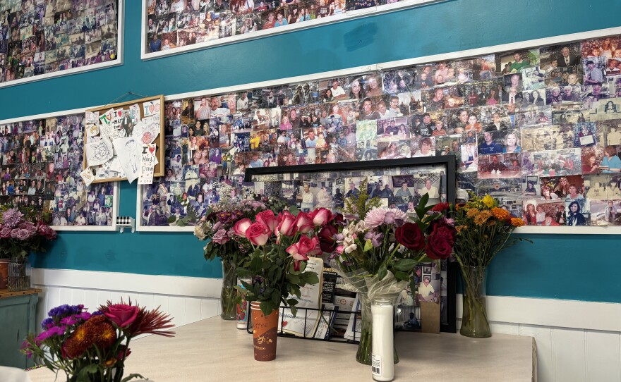 Those who knew Mary brought flowers, messages and candles to remember the donut shop owner. The memorial was on display when KPBS visited the shop on Oct. 27, 2025.