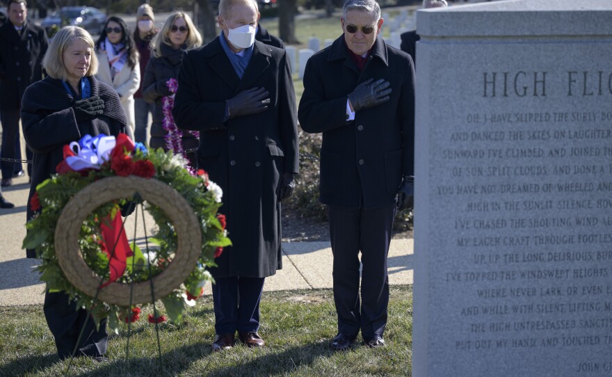 NASA officials including Deputy Administrator Pam Melroy, far left, visit the Space Shuttle Challenger Memorial at Arlington National Cemetery during NASA's Day of Remembrance in January 2022.