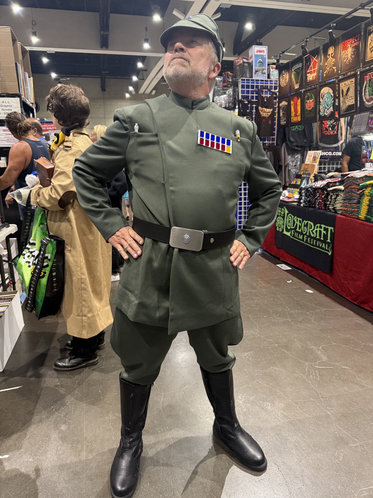 Erik Hogen cosplays as an Imperial officer from <i>Star Wars, </i>at Comic-Con on July 24, 2025. He said that the colored squares on his shirt indicate that he is a “High Admiral” and that the pen-shaped devices clipped onto his shirt pockets are like keys, allowing officers to access certain parts of a battle station, such as the “Death Star.”