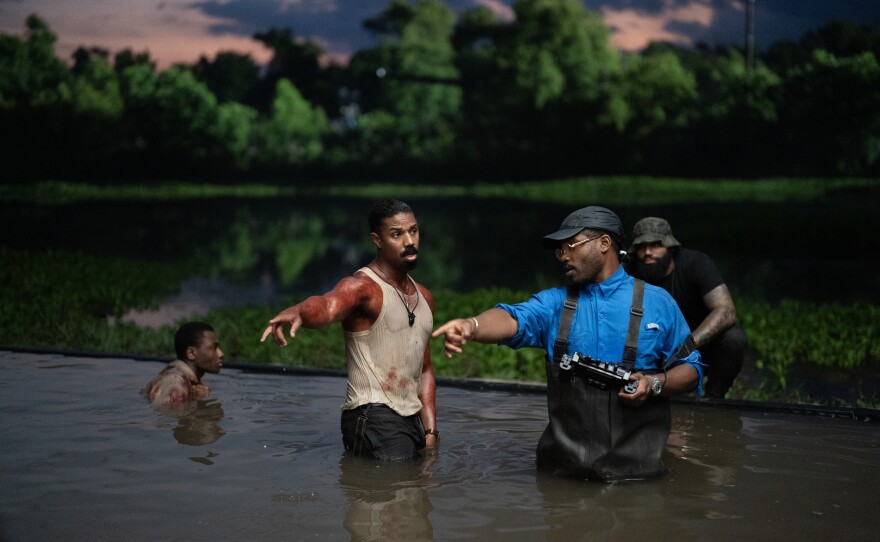Michael B. Jordan being directed by Ryan Coogler on the set of "Sinners." (2025)