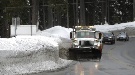 A snowplow clears snow from the side of Highway 50 near Echo Summit, Calif., Thursday, Feb. 2, 2017. 