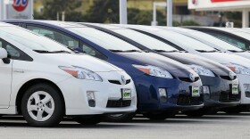 Brand new Toyota Prius hybrids sit on the sales lot at City Toyota on November 30, 2010 in Daly City, California.