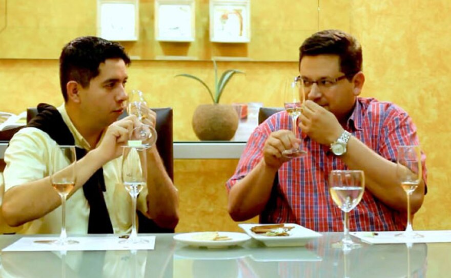 Host Jorge Meraz (right) learns about the Tequila-making process at the Jose Cuervo factory and the right way to taste this drink.
