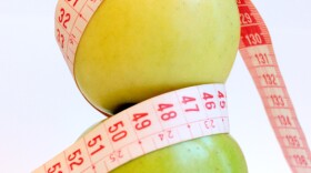 "D is for Diet," September 2008. Apples pictured with measuring tape.  Photo by Gloria Garcia.