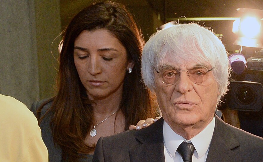 The mother of Fabiana Flosi, seen here with her husband, Formula One racing chief Bernie Ecclestone, has reportedly been kidnapped in Brazil. Flosi and Ecclestone are seen here in 2014, after a court proceeding in Germany.