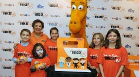 Students and a teacher from the PS229 school in Woodside, N.Y., attend a Trick-or-Treat for UNICEF 60th anniversary celebration in New York City.