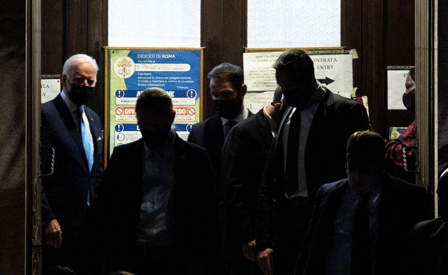 President Biden leaves Saint Patrick's Church after attending mass on Saturday in Rome on the sidelines of the G-20 summit.