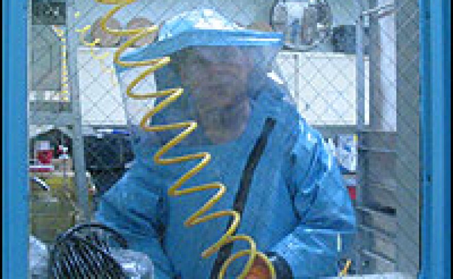 Dr. Thomas Geisbert of the U.S. Army Medical Research Institute of Infectious Diseases in the "space suit" that's required to enter the maximum-security lab at Fort Detrick, Md.