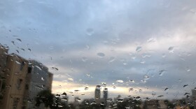 Downtown San Diego is seen from Grant Hill through a rainy windshield, Jan. 15, 2019.