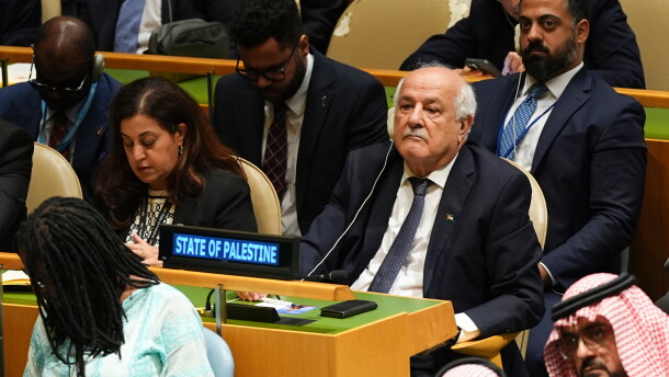 Palestinian ambassador to the U.N. Riyad Mansour, right, attends the 80th session of the United Nations General Assembly, Tuesday, Sept. 23, 2025, at UN headquarters